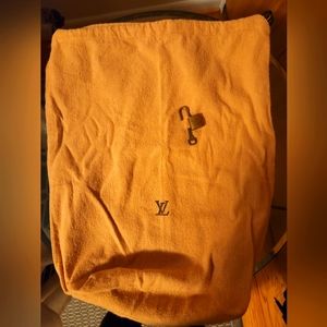 Authentic Louis Vuitton dust bag.